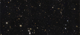 STK203155S
A panoramic view of over 7,500 galaxies stretching back through most of the universe's history.