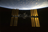 STK203243S
International Space Station  backdropped against Earth's horizon.