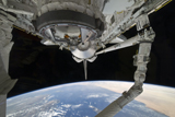 STK203301S
View of Space Shuttle Discovery over Earth's horizon.