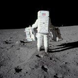 STK203413S
Astronaut carrying equipment to the deployment site on the moon.