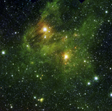 STK203510S
Two extremely bright stars illuminate a greenish mist in deep space.