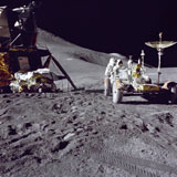 STK203724S
Apollo 15 astronaut loads the lunar rover with tools and equipment.