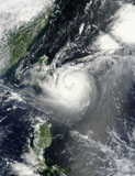 STK204009S
Typhoon Tembin hovers over the western Pacific Ocean.