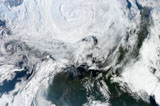 STK204054S
Satellite view of large and powerful cyclone churning over the Arctic.