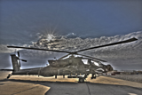 TMO100012M
High dynamic range photo of an  AH-64D Apache Longbow Block III attack helicopter.