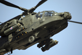 TMO100071M
An AH-64 Apache in flight over the Baghdad Hotel in central Baghdad, Iraq.