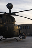 TMO100162M
An OH-58D Kiowa helicopter during sunset.