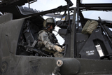 TMO100164M
An AH-64D Apache Longbow Block III prepares for takeoff.