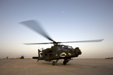 TMO100174M
An AH-64D Apache Longbow Block III gets ready for takeoff.