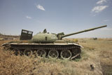 TMO100356M
A Russian T-62 main battle tank rests in an armor junkyard.