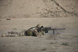 TMO100410M
German soldier firing a Barrett M82A1 rifle.