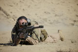 TMO100411M
U.S. Contractor sights in a Barrett M82A1 rifle.