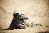 TMO100412M
A German soldier sights in a Barrett M82A1 rifle.