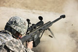 TMO100420M
U.S. Army soldier fires a Barrett M82A1 rifle on a firing range