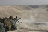 TMO100425M
U.S. Army soldier fires a Barrett M82A1 rifle.