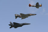 TMO100697M
An F-15 Eagle, P-47 Thunderbolt, and F-4 Phantom fly a heritage flight.