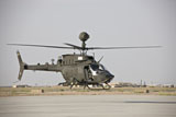 TMO100735M
An OH-58D Kiowa helicopter takes off from COB Speicher.