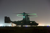 TMO100813M
A special forces CV-22 Osprey with rotor lights on, Iraq.