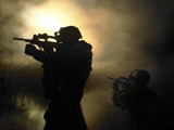 TWE300041M
Special operation forces combat divers armed with Steyr AUG assault rifles.