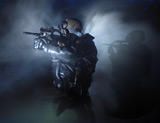 TWE300042M
Special operation forces combat divers armed with Steyr AUG assault rifles.