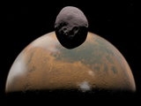 WMY100049S
Artist's concept of Mars and its tiny moon Phobos.