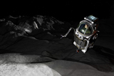 WMY100238S
Two Manned Maneuvering Vehicles explore the airless, microgravity environment of a small asteroid.