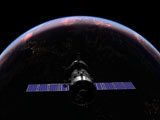 WMY100261S
A Soyuz TMA-M spacecraft soars over teh Atlantic Ocean at sunset.