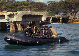 WOD100142M
Navy Seals combat swimmers sitting in a combat rubber raiding craft, Oahu, Hawaii.