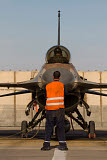 ZDN100034M
Airman signals to the pilot of an F-16A Netz of the Israeli Air Force.