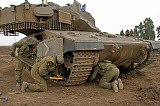 ZDN100105M
Track replacement on a Israel Defense Force Merkava Mark IV main battle tank.