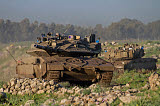 ZDN100107M
Two Israel Defense Force Merkava Mark IV main battle tanks.