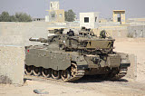 ZDN100135M
An Israel Defense Force Merkava Mark II main battle tank in urban warfare.