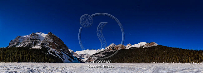 Panorama of Lake Louise under winter moonlight in Banff National Park ...