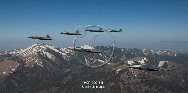 F-22 Raptors fly in formation during a training mission over New Mexico ...