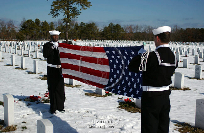 Military Rites Folding A Flag At Funeral