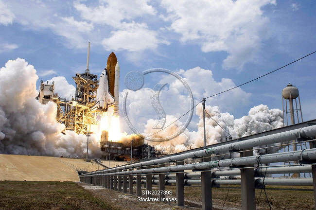 Space Shuttle Atlantis lifts off from its launch pad. | Stocktrek Images
