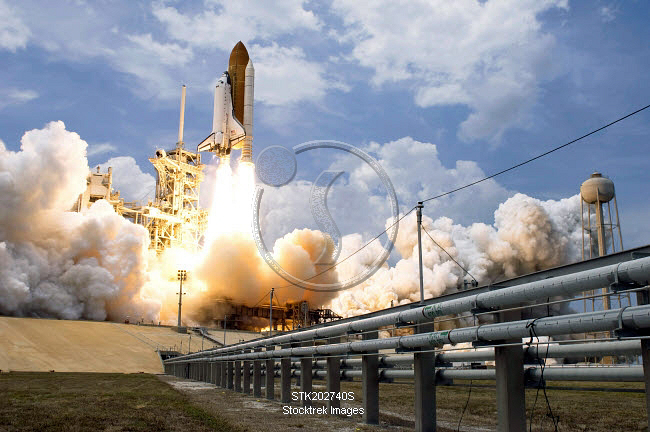 Space Shuttle Atlantis lifts off from its launch pad. | Stocktrek Images