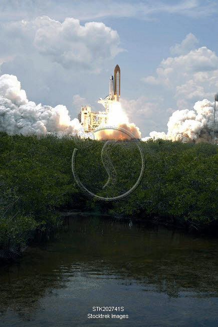 Space Shuttle Atlantis lifts off from its launch pad. | Stocktrek Images
