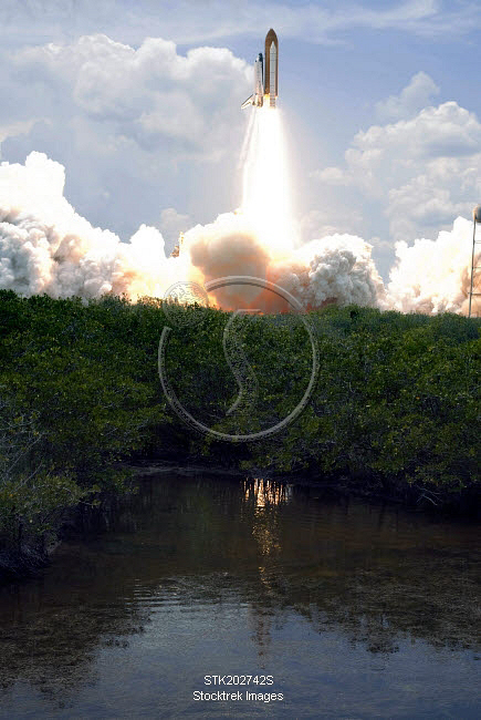 Space Shuttle Atlantis lifts off from its launch pad. | Stocktrek Images