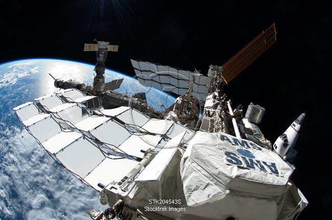 Space shuttle Atlantis docked to the International Space Station ...