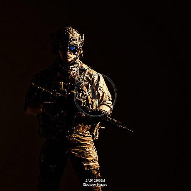 Elite member of U.S. Army rangers in combat helmet and night vision ...